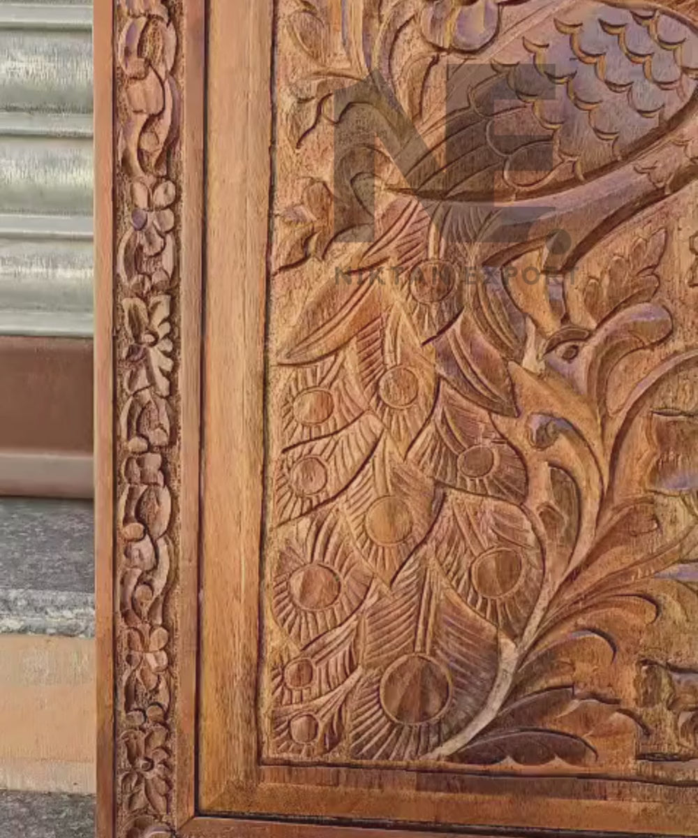 Warm brown wooden wall panels with ornamental borders