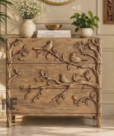 Wooden dresser with birds and branches
