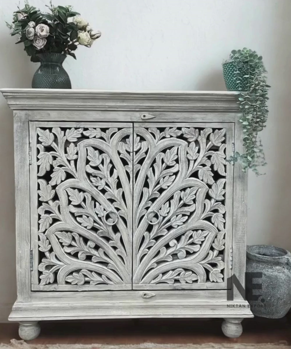 Front view of floral mango wood sideboard